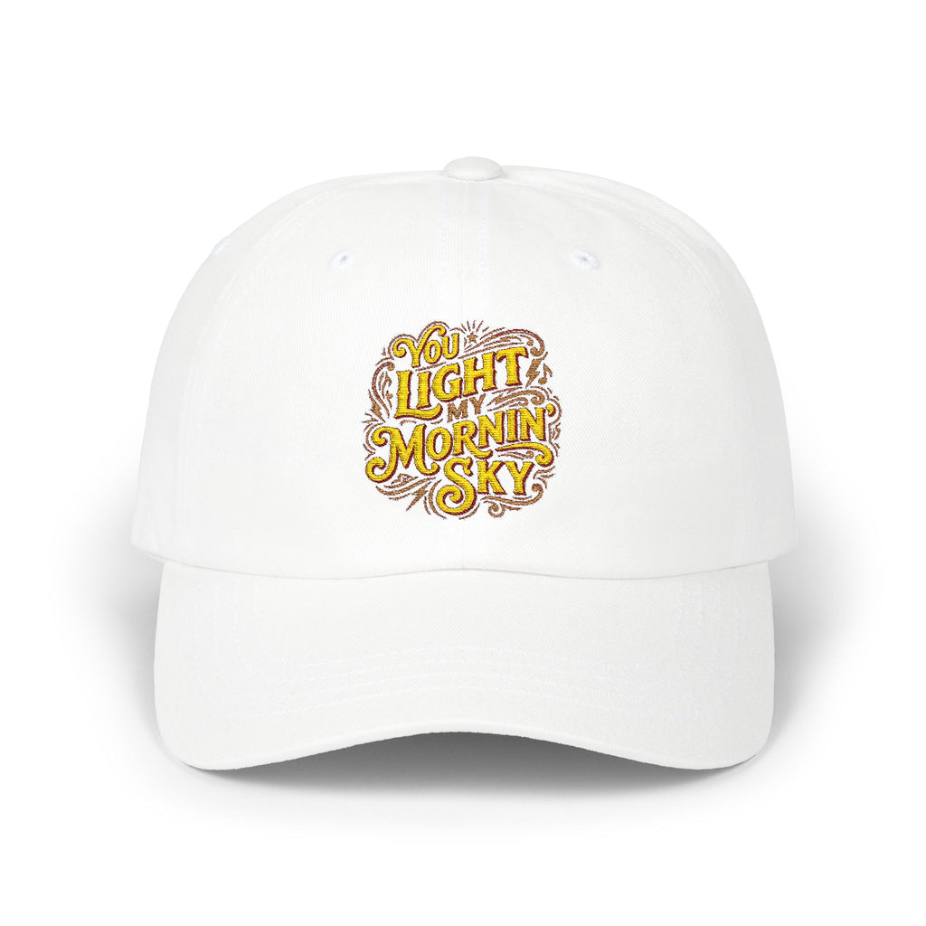White cap with yellow text on a white background