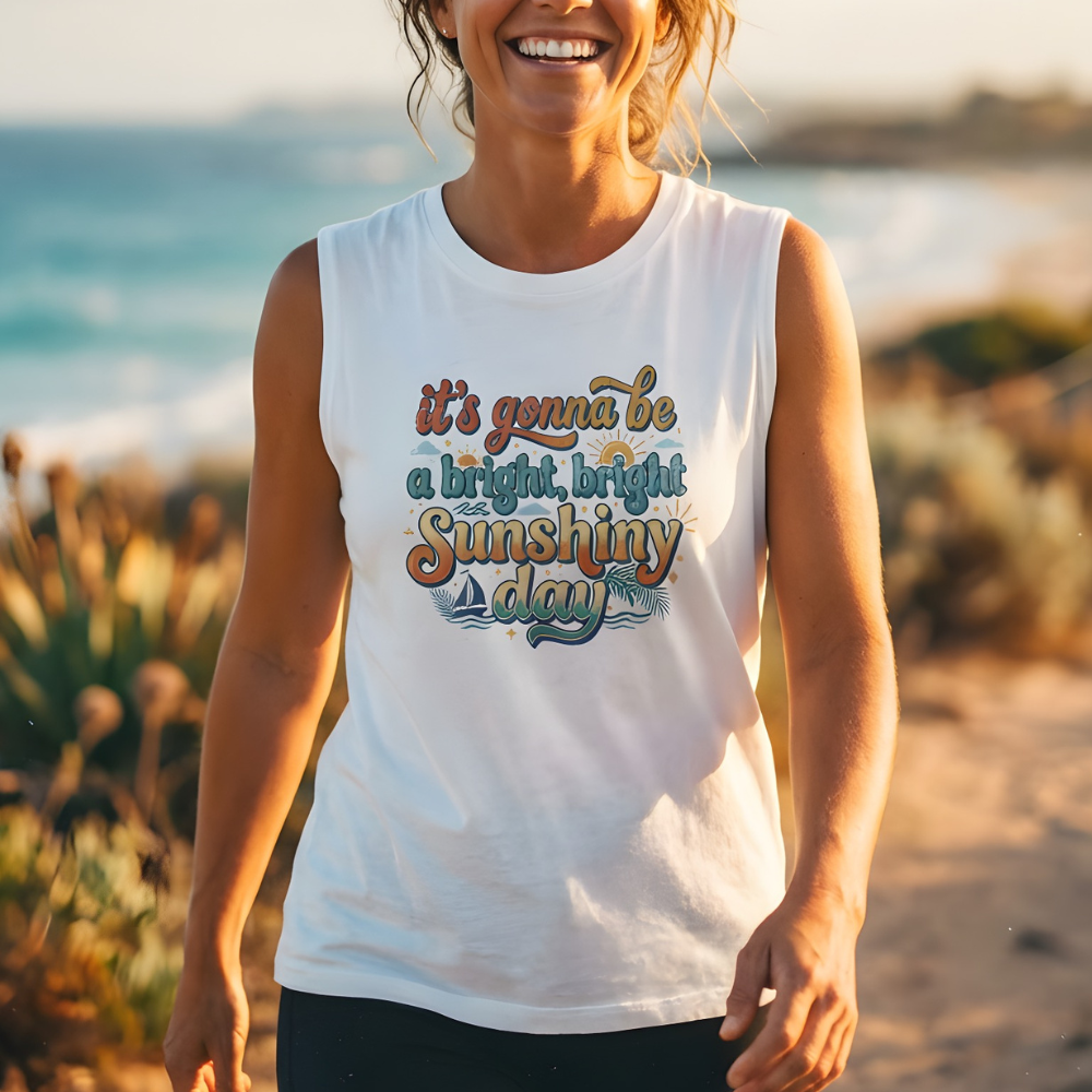 Woman wearing a white sleeveless shirt with text on a beach