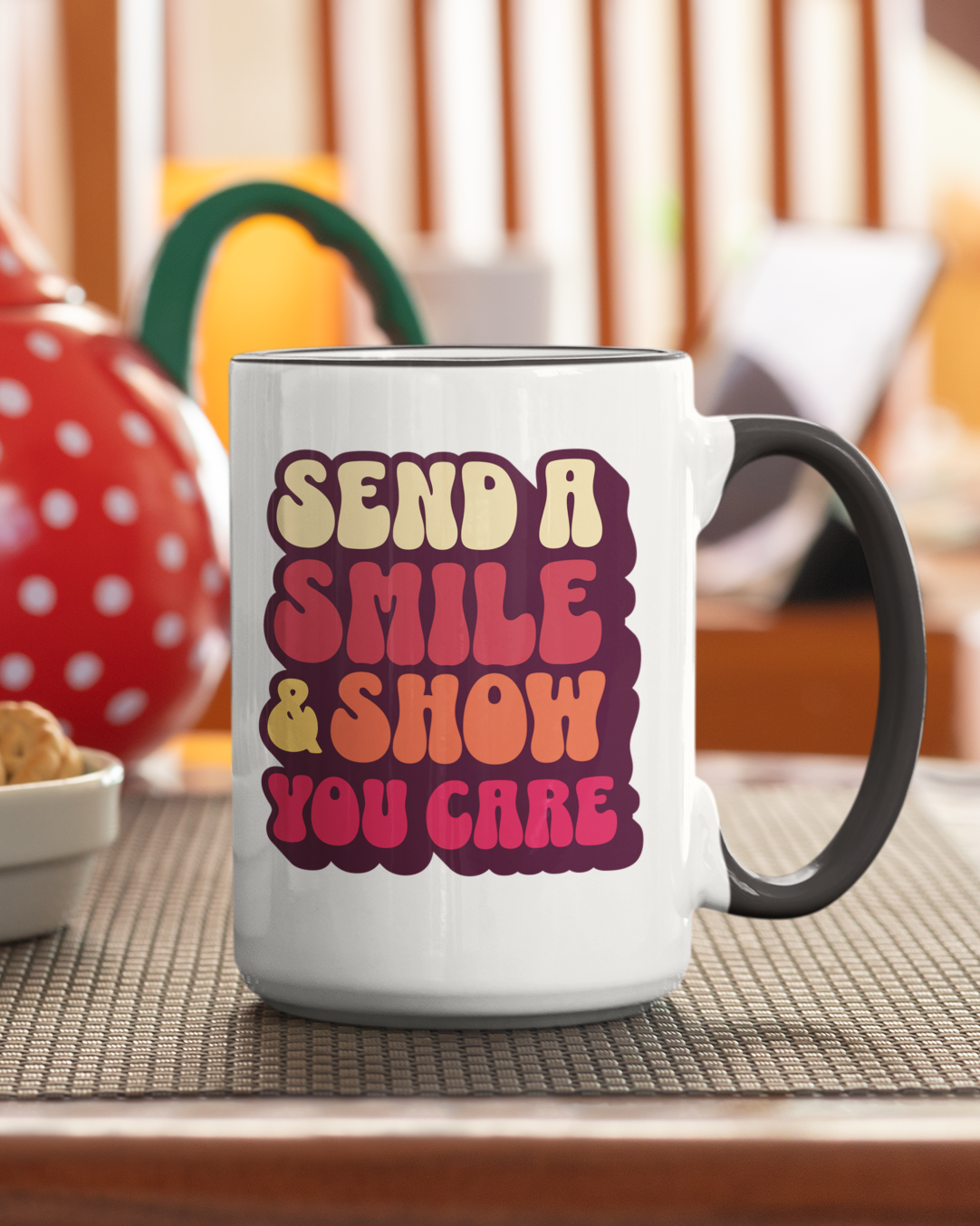 White mug with colorful text on a kitchen counter