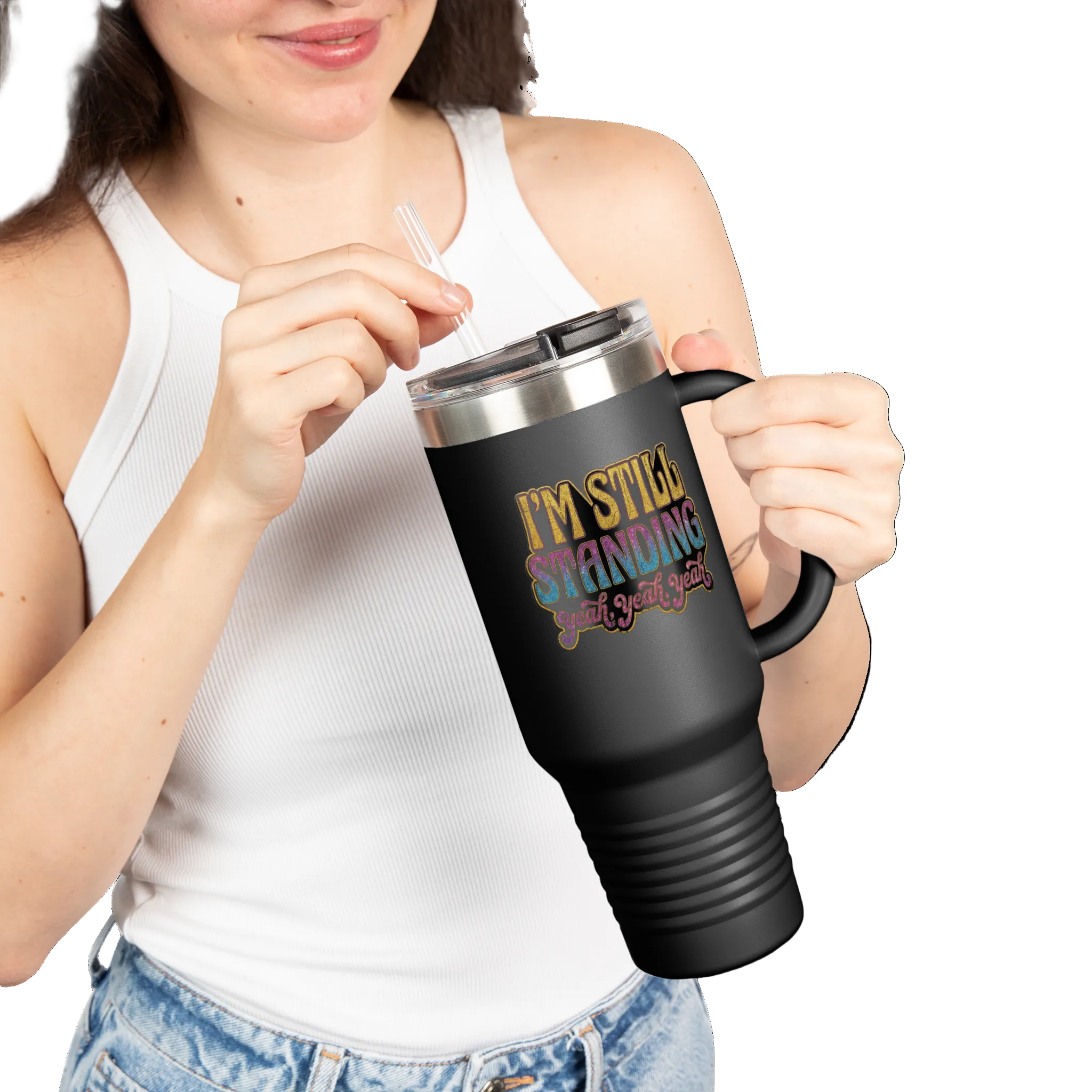 Person holding a black travel mug with colorful text on a white background
