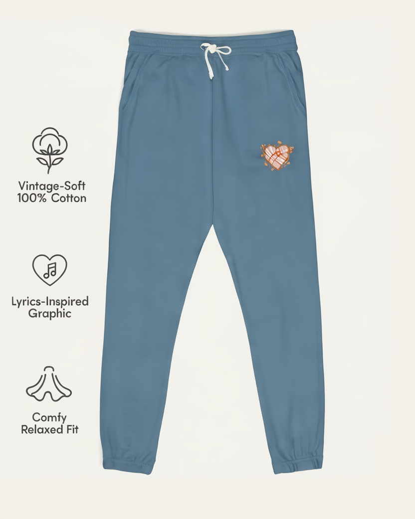 Blue sweatpants with a heart and music note graphic on a white background, featuring Lyrical Sunshine branding.