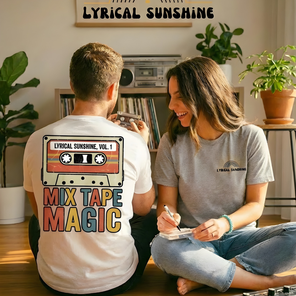 Two people sitting on the floor with 'Lyrical Sunshine' t-shirts, surrounded by vinyl records and a tape recorder.