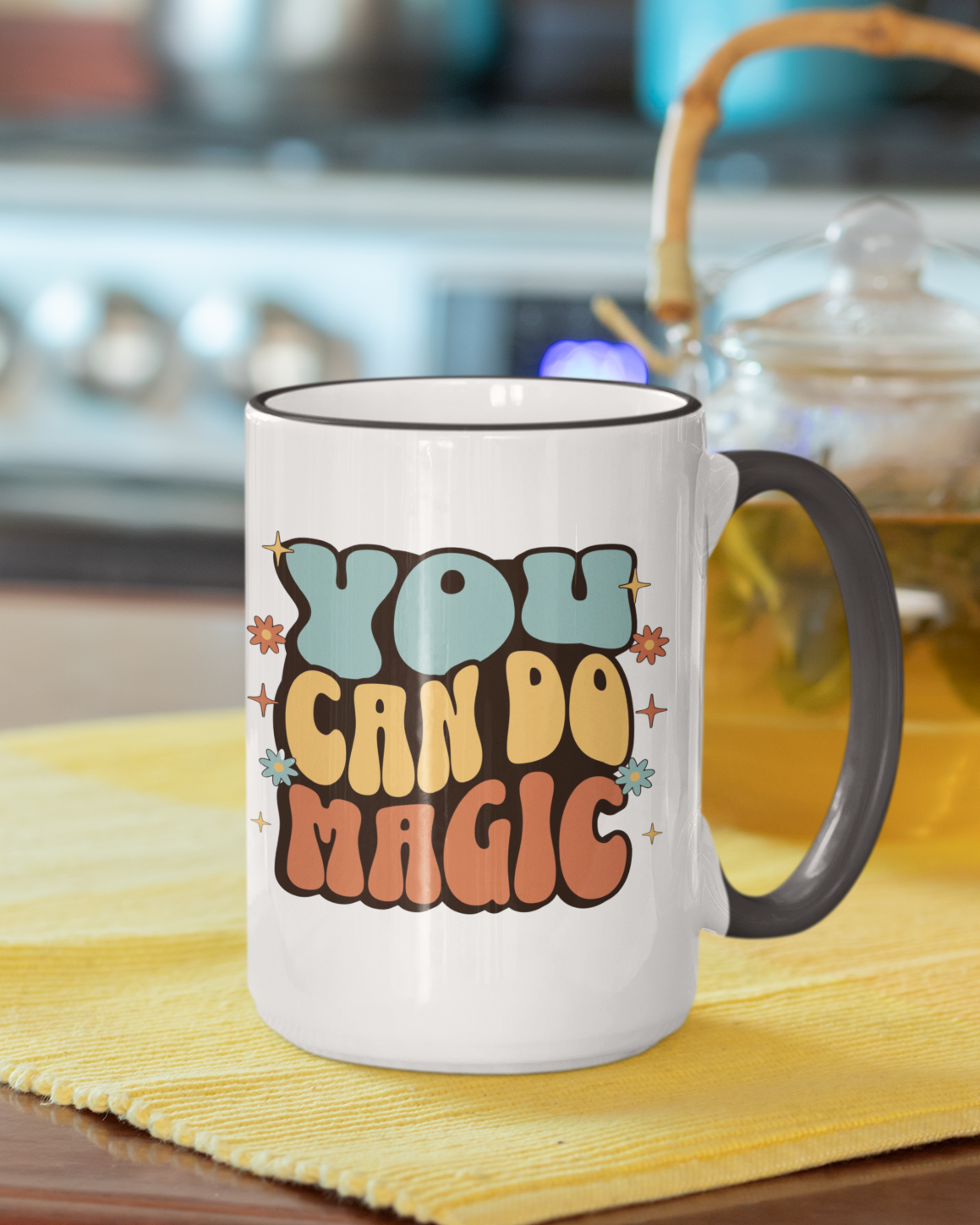 Mug with 'You Can Do Magic' text on a kitchen counter